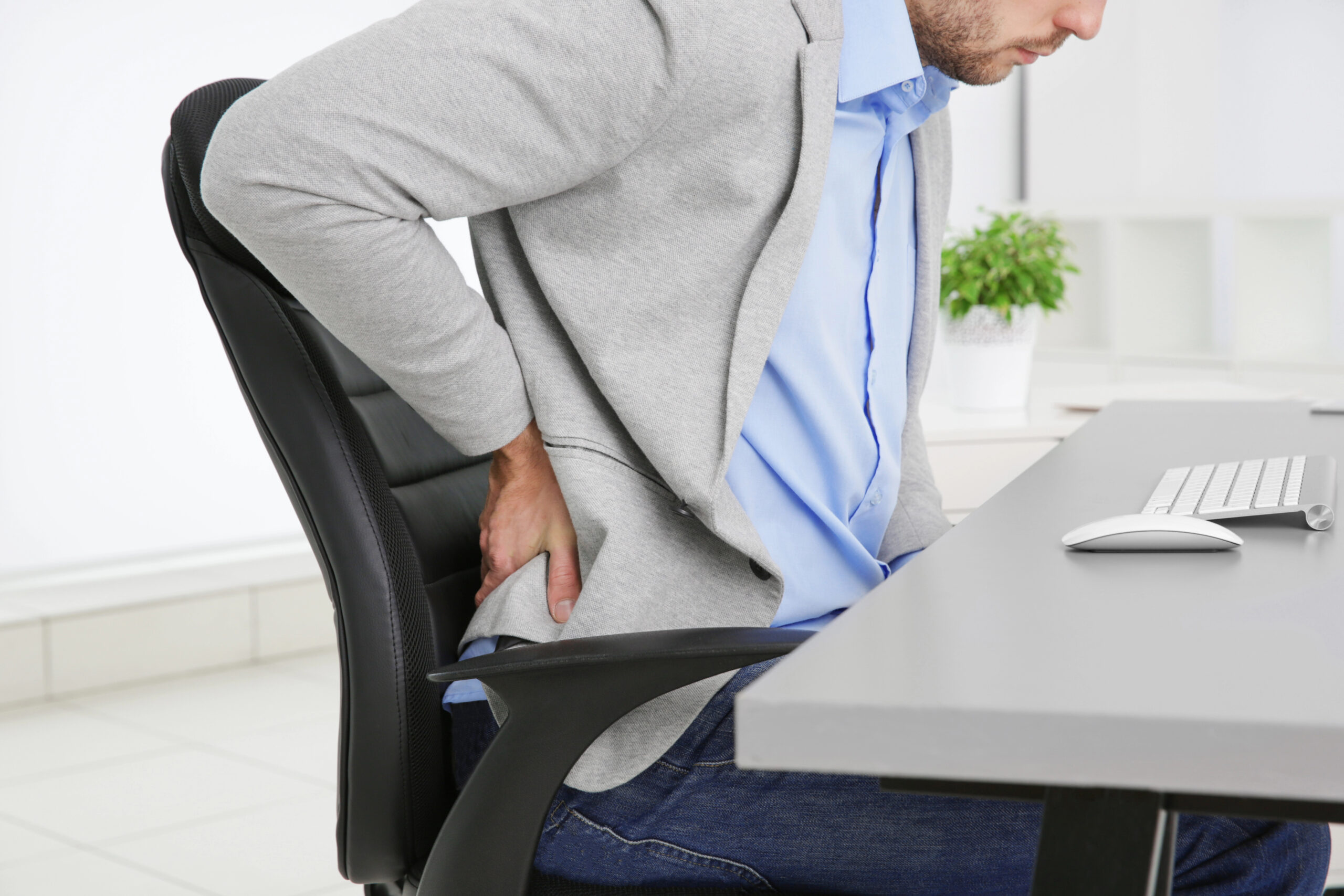 office worker with lower back pain